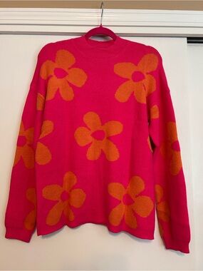 Bright Pink Crewneck Sweater with Orange Floral Motif